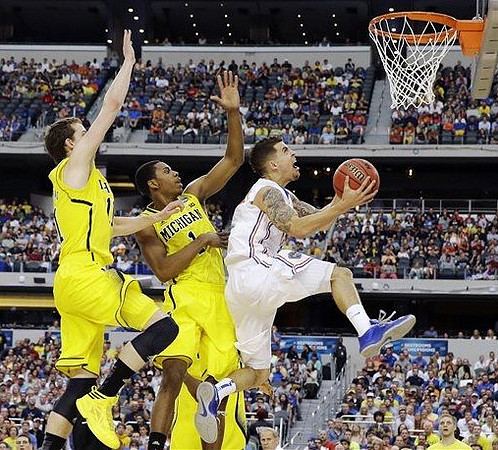 Nik Stauskas (11) and Glenn Robinson III (1)
