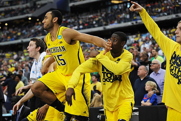 Nik Stauskas (11), Jon Horford (15), Caris LeVert (23), and Max Bielfeldt (44)