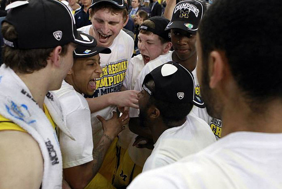 Nik Stauskas (11), Trey Burke (3), Blake McLimans (22), Matt Vogrich (13), Caris LeVert (23), and Jon Horford (15)