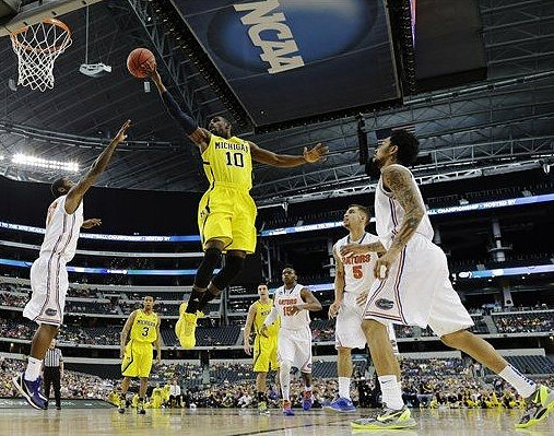 Tim Hardaway Jr. (10), Trey Burke (3), and Mitch McGary (4)