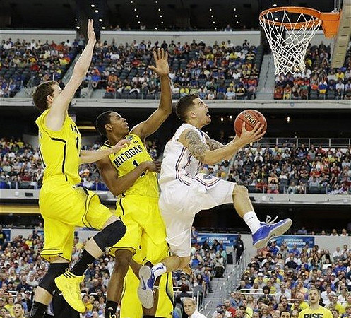 Nik Stauskas (11) and Glenn Robinson III (1)