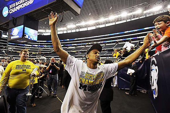 Max Bielfeldt (44), Mitch McGary (4), Eso Akunne (5), Jordan Morgan (52), Corey Person (32), and Trey Burke (3)