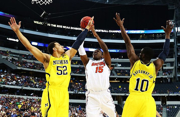 Jordan Morgan (52) and Tim Hardaway Jr. (10)