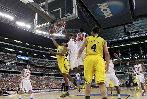 Glenn Robinson III (1) and Mitch McGary (4)