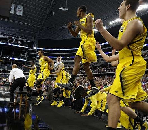 Trey Burke (3), Jordan Morgan (52), and Corey Person (32)