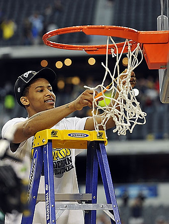 Blake McLimans (22), Jordan Morgan (52), and Trey Burke (3)
