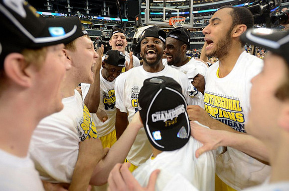 Blake McLimans (22), Matt Vogrich (13), Caris LeVert (23), Mitch McGary (4), Corey Person (32), Tim Hardaway Jr. (10), and Jon Horford (15)