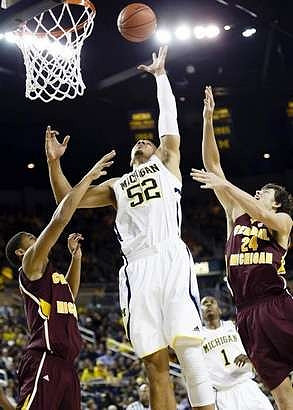 Jordan Morgan (52) and Glenn Robinson III (1)