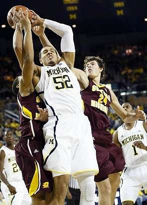 Jordan Morgan (52), Caris LeVert (23), and Glenn Robinson III (1)