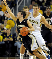 Mitch McGary (4) and Matt Vogrich (13)