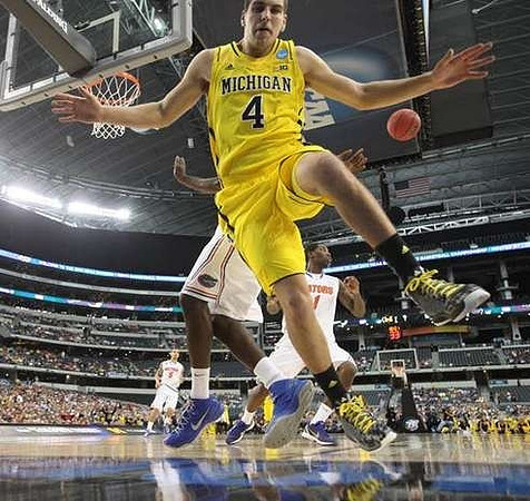 Jordan Morgan (52) and Glenn Robinson III (1)
