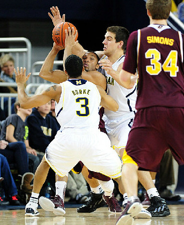 Trey Burke (3) and Mitch McGary (4)