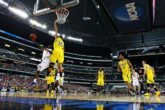 Jon Horford (15), Tim Hardaway Jr. (10), Glenn Robinson III (1), Trey Burke (3), and Nik Stauskas (11)