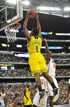 Mitch McGary (4) and Tim Hardaway Jr. (10)