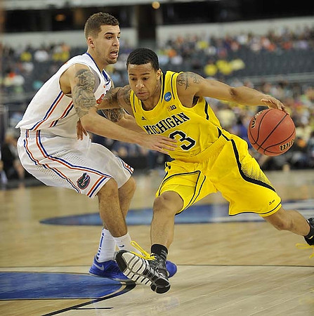 Trey Burke (3) and Tim Hardaway Jr. (10)