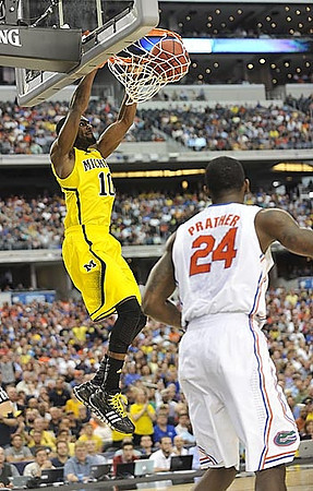 Corey Person (32), Tim Hardaway Jr. (10), Nik Stauskas (11), and John Beilein