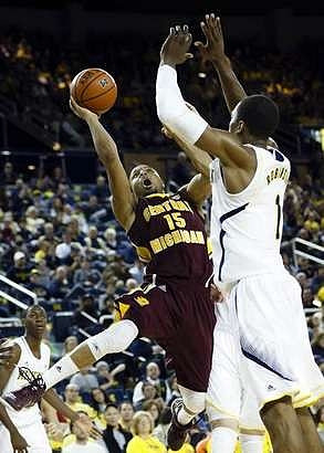 Glenn Robinson III (1) and Caris LeVert (23)