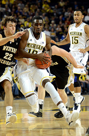 Tim Hardaway Jr. (10) and Jon Horford (15)