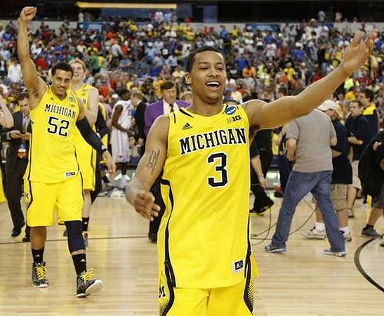 Nik Stauskas (11) and David Brandon