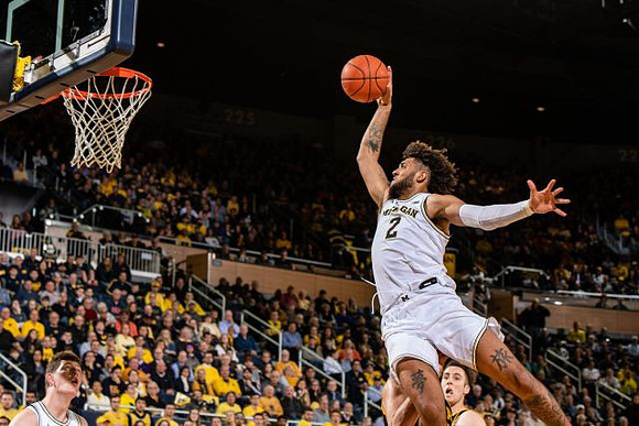 Isaiah Livers (2) and Jon Teske (15)