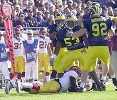 Shantee Orr, Jon Shaw (22), and Dan Rumishek (92)