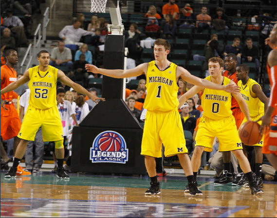 Jordan Morgan (52), Stu Douglass (1), Zack Novak (0), and Tim Hardaway Jr. (10)