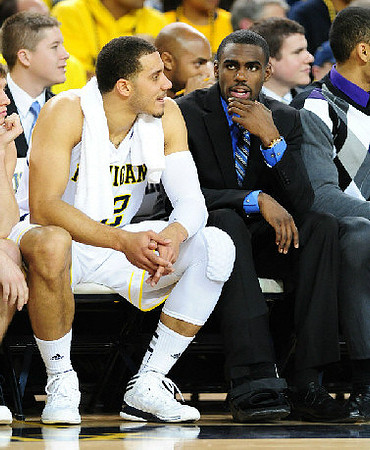 Jordan Morgan (52), Tim Hardaway Jr. (10), C.J. Lee, and Jon Horford (15)