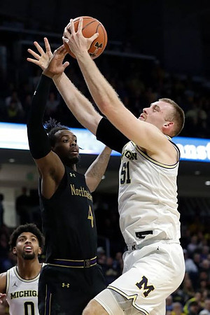 David DeJulius (0) and Austin Davis (51)