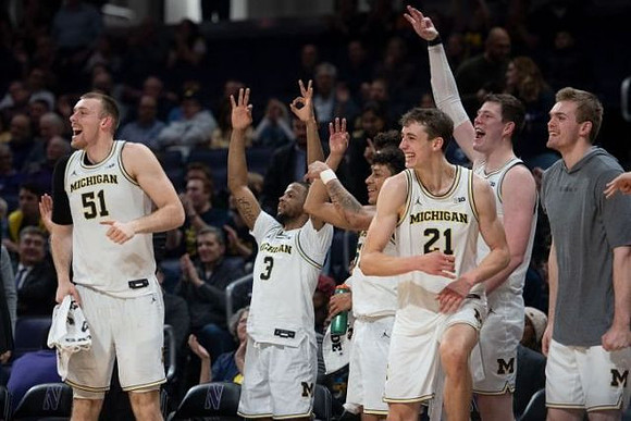 Austin Davis (51), Zavier Simpson (3), Eli Brooks (55), Franz Wagner (21), Jon Teske (15), and Jaron Faulds (44)