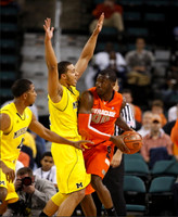 Darius Morris (4) and Jordan Morgan (52)