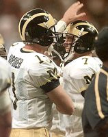 Drew Henson (7) and Jason Kapsner (13)
