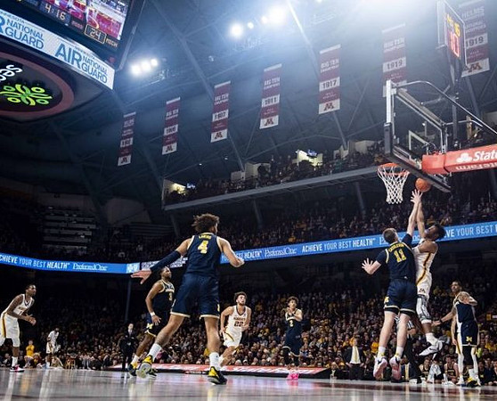 Zavier Simpson (3), Isaiah Livers (4), Colin Castleton (11), Jordan Poole (2), and Charles Matthews (1)