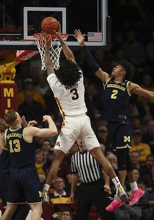 Ignas Brazdeikis (13) and Jordan Poole (2)