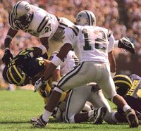 Justin Fargas (34) and Bill Seymour (81)