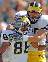 Mario Manningham (86) and Tyler Ecker (89)