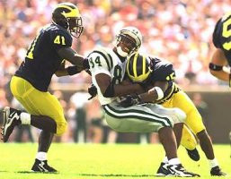 DeWayne Patmon (15) and Tommy Hendricks (41)