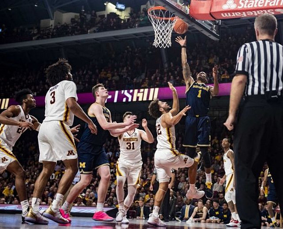Jon Teske (15) and Charles Matthews (1)