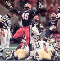 Jeff Backus (79) and Dwight Mosley (38)