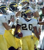 Michael Hart (20), Chad Henne (7), Tim Massaquoi (88), and Tyler Ecker (89)