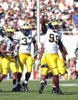Pierre Woods (99), Chris Graham (37), Grant Mason (13), and David Harris (45)