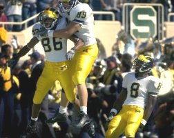 Mario Manningham (86), Tyler Ecker (89), and Jason Avant (8)