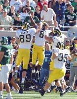 Jason Avant (8), Tyler Ecker (89), Chad Henne (7), and Brian Thompson (35)
