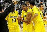 Tim Hardaway Jr. (10), Darius Morris (4), Evan Smotrycz (23), Colton Christian (45), and  Josh Bartelstein (20)