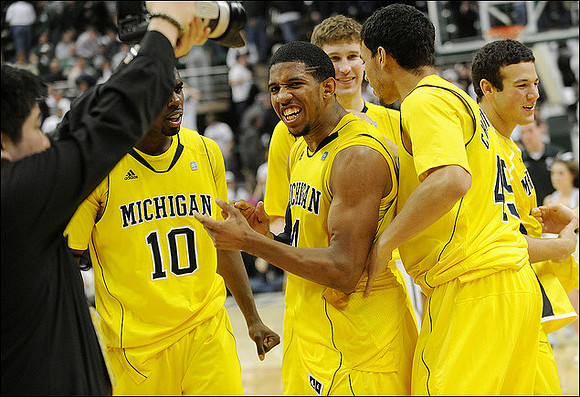 Tim Hardaway Jr. (10), Darius Morris (4), Evan Smotrycz (23), Colton Christian (45), and  Josh Bartelstein (20)
