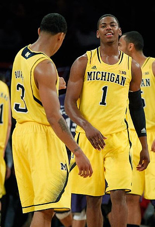 Trey Burke (3), Glenn Robinson III (1), and Jon Horford (15)