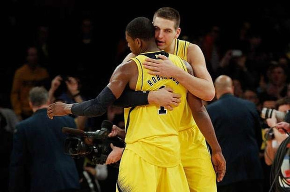Glenn Robinson III (1) and Mitch McGary (4)