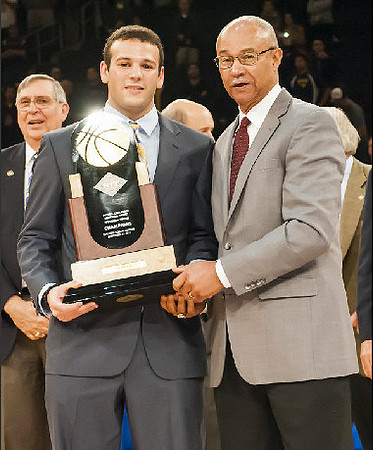 Josh Bartelstein (20) and NIT Season Tip-Off Trophy