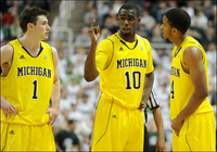 Stu Douglass (1), Tim Hardaway Jr. (10), and Darius Morris (4)
