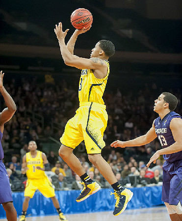 Glenn Robinson III (1) and Trey Burke (3)
