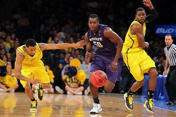 Trey Burke (3) and Glenn Robinson III (1)